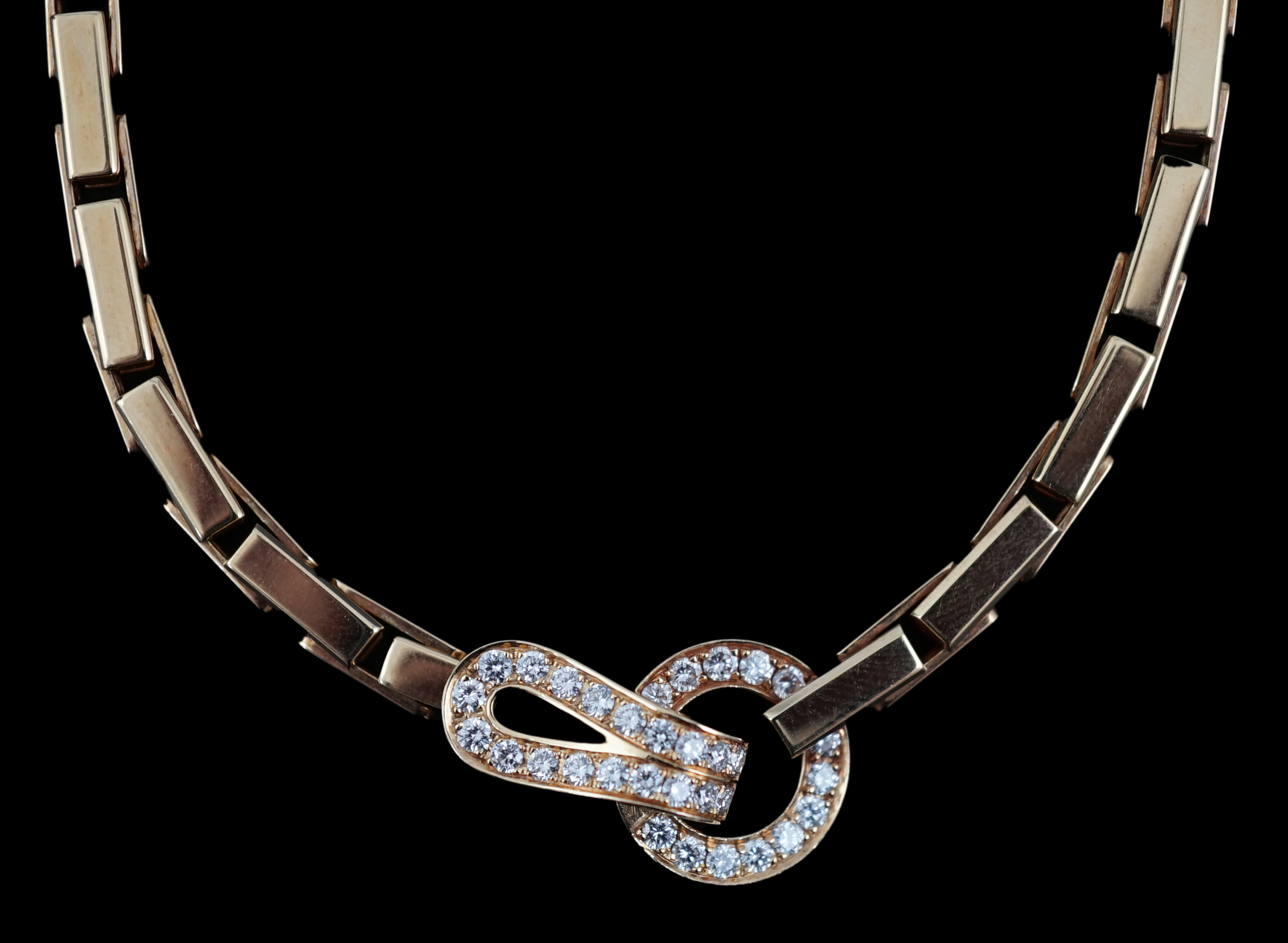 A modern Cartier 18ct gold necklace, with diamond cluster set clasp